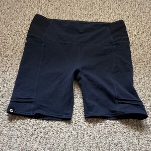 Oiselle mid length pocket Women's Navy running Shorts